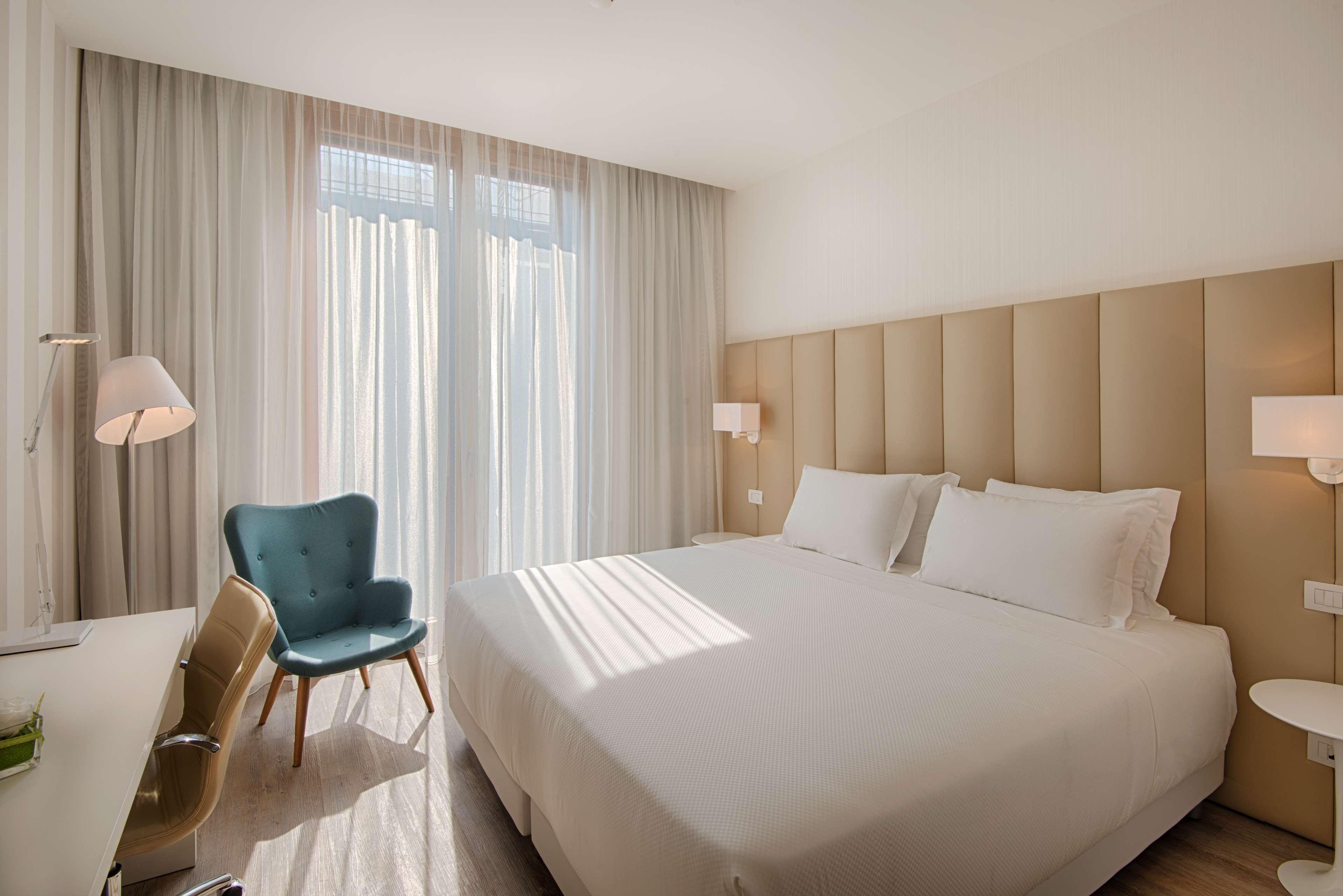 Hotel NH Trento Esterno foto